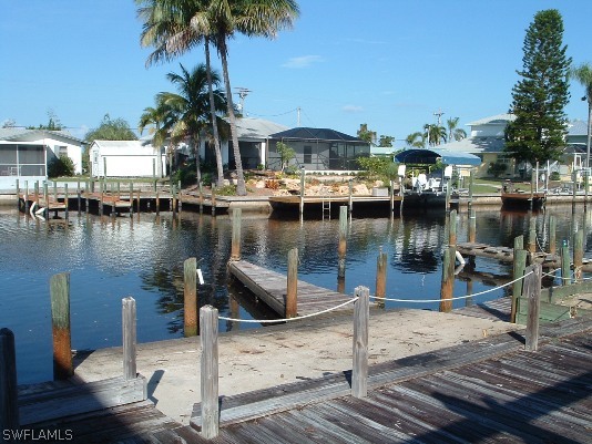 3255 Stringfellow Road St. James City, FL 33956 - Photo 5 of 16 a view of a lake