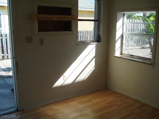 3255 Stringfellow Road St. James City, FL 33956 - Photo 6 of 16 a view of an empty room and window