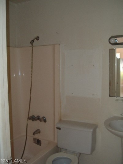 3255 Stringfellow Road St. James City, FL 33956 - Photo 9 of 16 a bathroom with a shower and a toilet