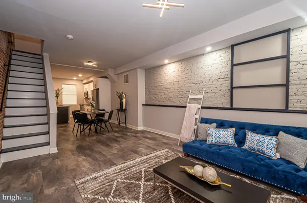 a living room with furniture and a table