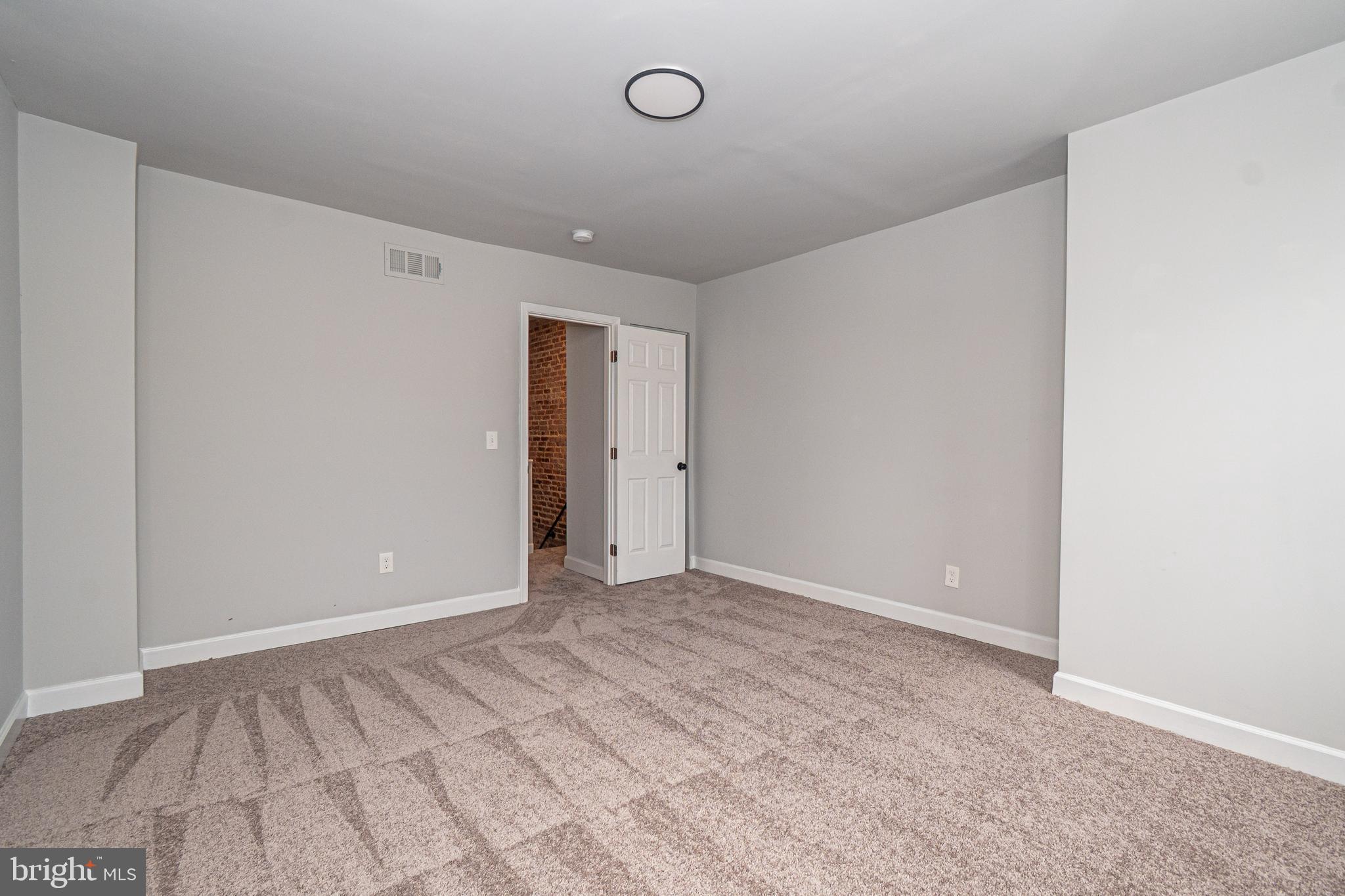 3103 East Monument Street Baltimore, MD 21205 - Photo 10 of 20 a view of an empty room