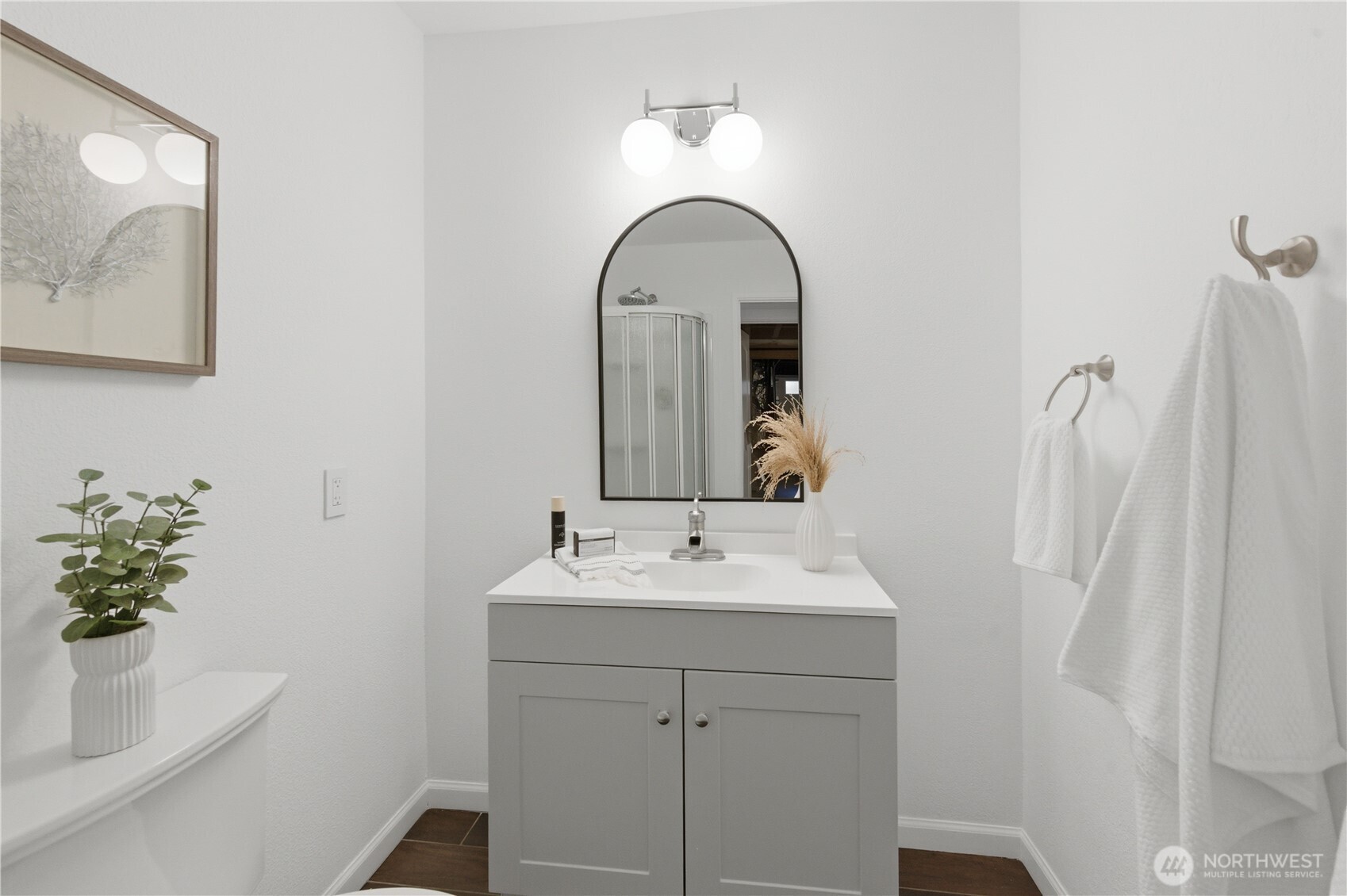 20911 30th Drive Southeast Bothell, WA 98021 - Photo 31 of 40 a bathroom with a sink a mirror and vanity
