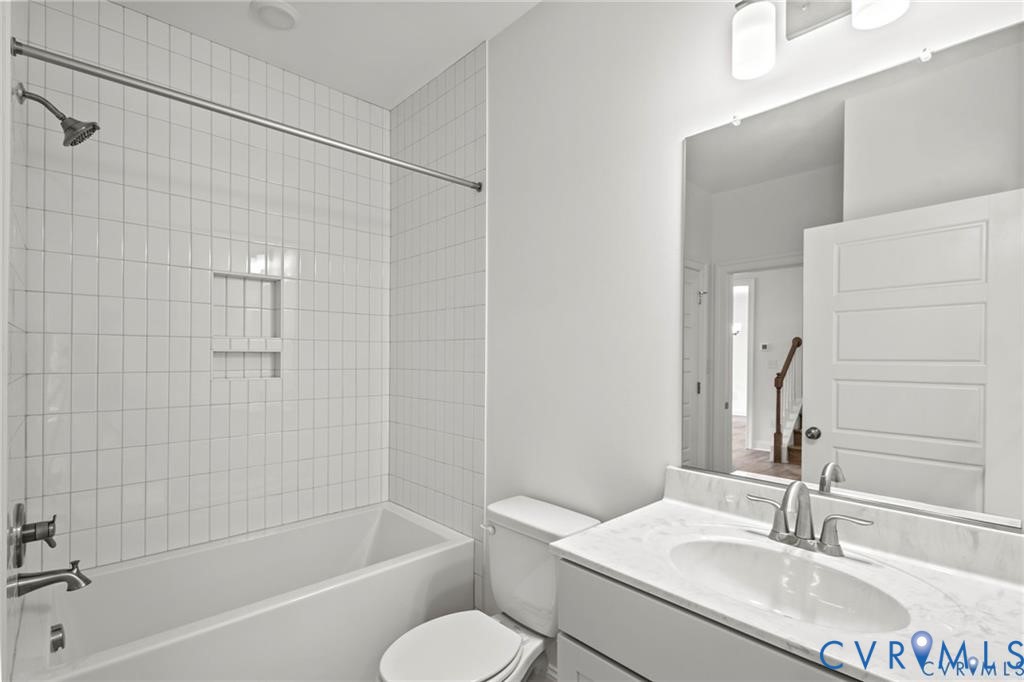 4927 Gooden Trail Quinton, VA 23141 - Photo 10 of 22 a bathroom with a granite countertop sink toilet and shower