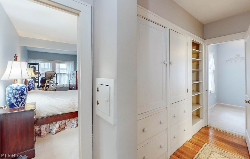 3189 Chadbourne Road Cleveland, OH 44120 - Photo 16 of 25 Hallway featuring built in features and light colored carpet