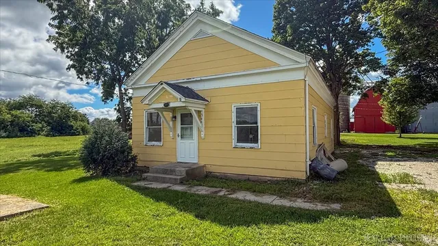 a house view with a garden space