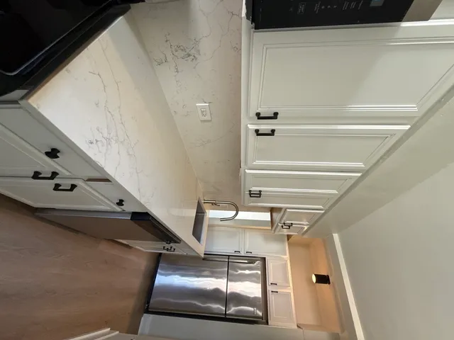 a view of staircase with a rug