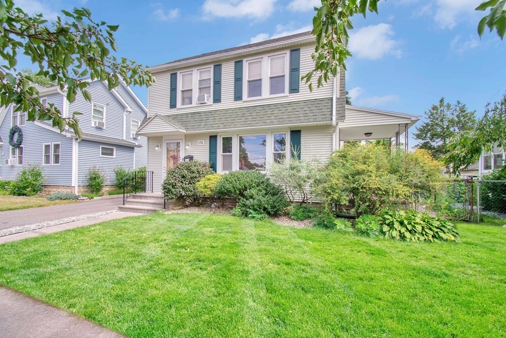 151 Rimmon Avenue Chicopee, MA 01013 - Photo 1 of 39 a front view of a house with a yard and plants