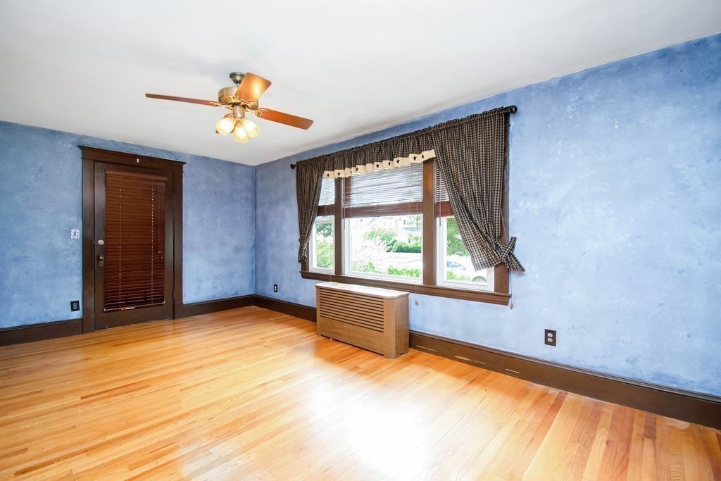 151 Rimmon Avenue Chicopee, MA 01013 - Photo 12 of 39 wooden floor in an empty room with a window