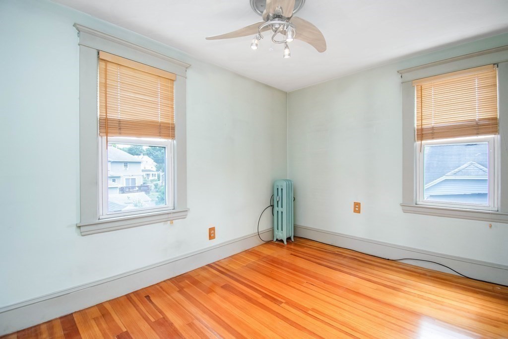 151 Rimmon Avenue Chicopee, MA 01013 - Photo 19 of 39 a bedroom with a bed and a window