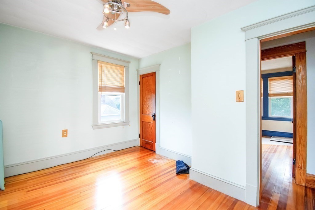 151 Rimmon Avenue Chicopee, MA 01013 - Photo 20 of 39 a view of empty room with wooden floor and fan