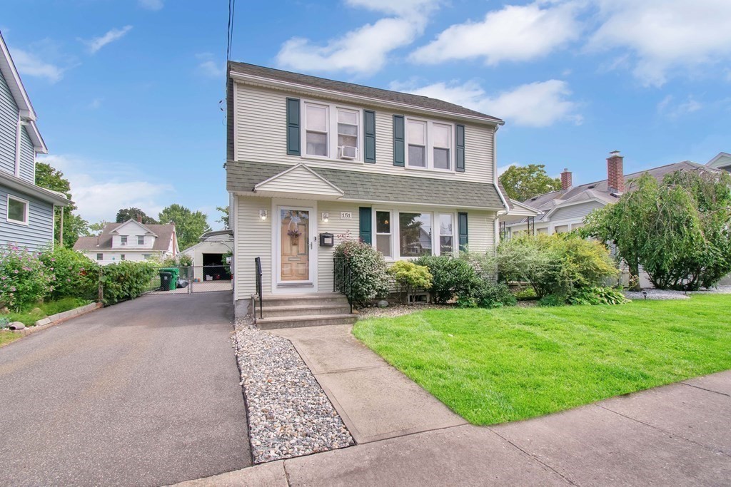 151 Rimmon Avenue Chicopee, MA 01013 - Photo 2 of 39 a front view of a house with garden