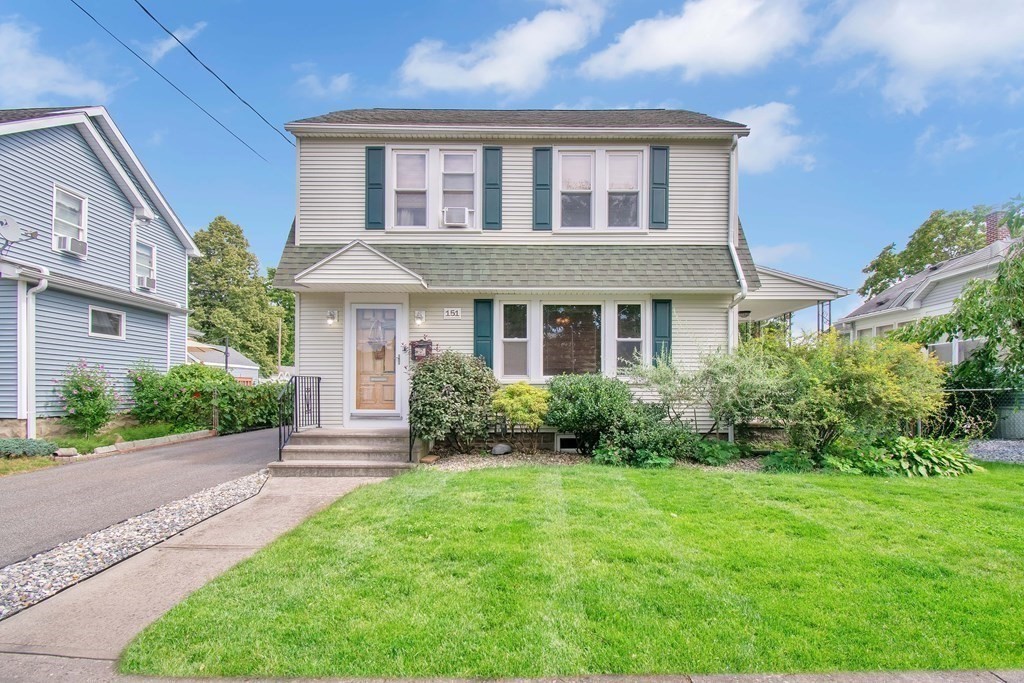 151 Rimmon Avenue Chicopee, MA 01013 - Photo 3 of 39 a front view of a house with garden and porch