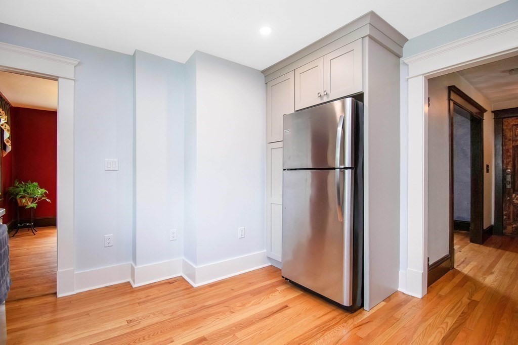151 Rimmon Avenue Chicopee, MA 01013 - Photo 6 of 39 a view of a kitchen with wooden floor and closet