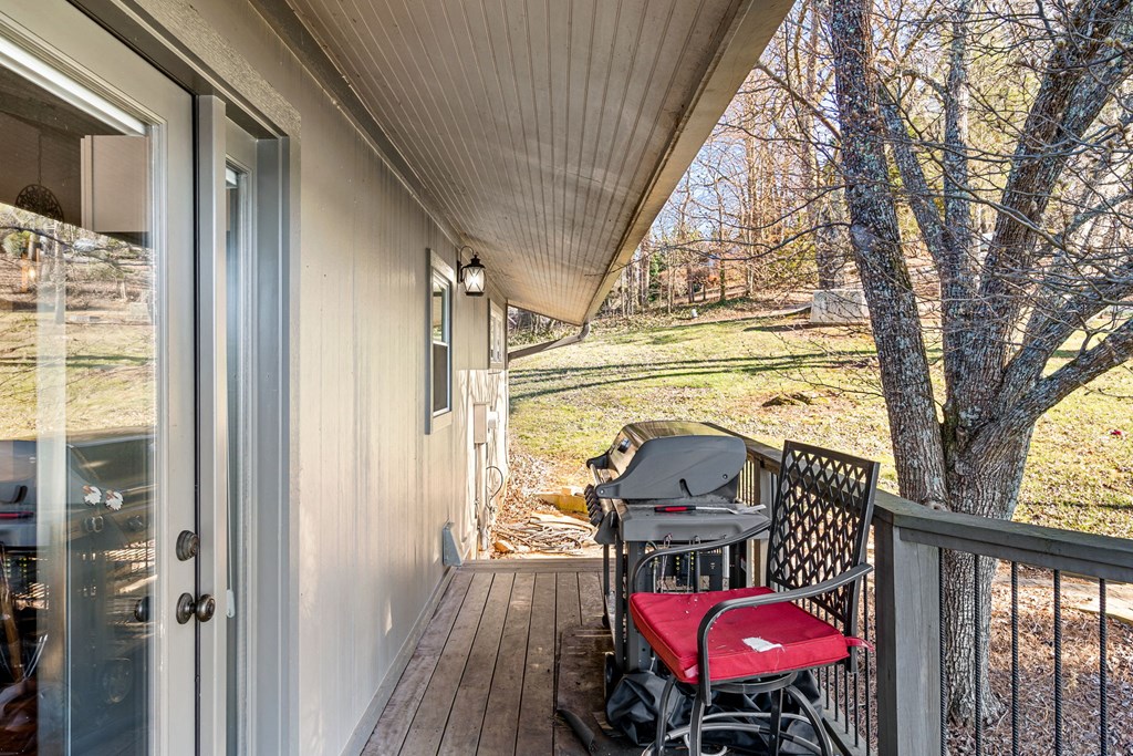 314 Kilpatrick Point Drive Hayesville, NC 28904 - Photo 34 of 50 a view of a balcony with furniture