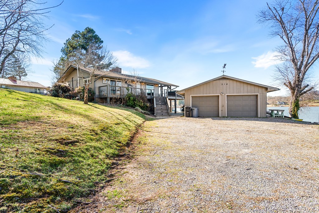 314 Kilpatrick Point Drive Hayesville, NC 28904 - Photo 45 of 50 a front view of a house with a yard