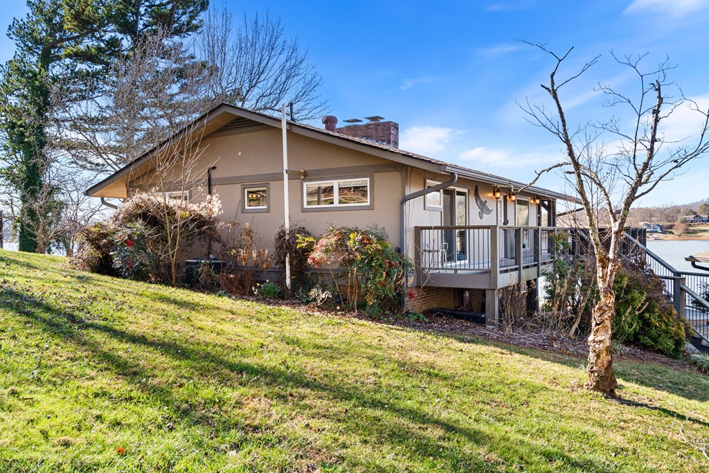 314 Kilpatrick Point Drive Hayesville, NC 28904 - Photo 48 of 50 a view of a house with a yard and large tree