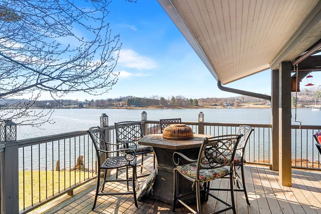 314 Kilpatrick Point Drive Hayesville, NC 28904 - Photo 8 of 50 a view of a chairs and table on the balcony