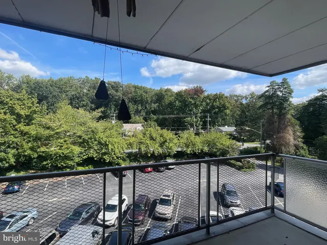 a view of balcony with furniture