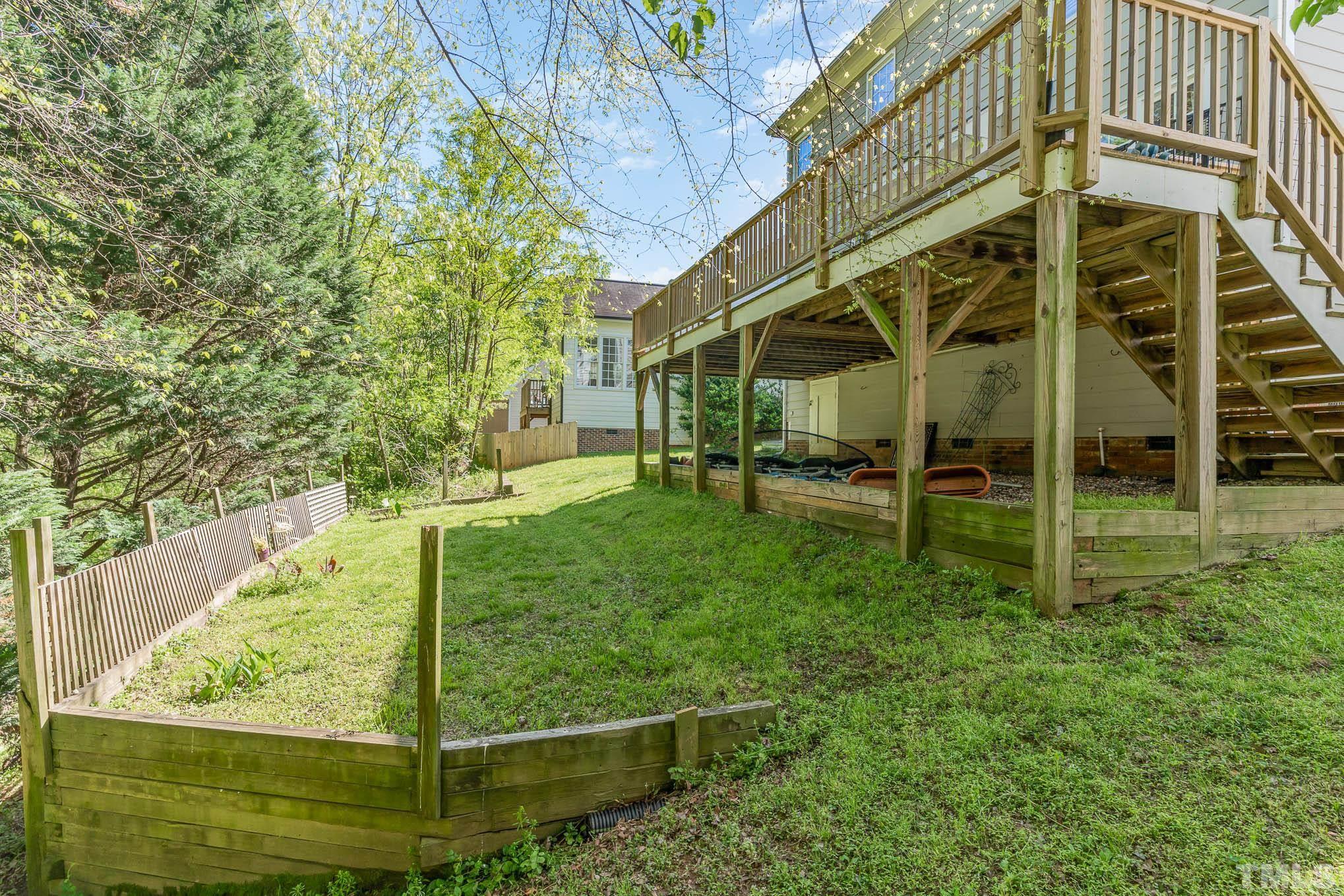 7920 Milltrace Run Raleigh, NC 27615 - Photo 8 of 9 a view of a backyard