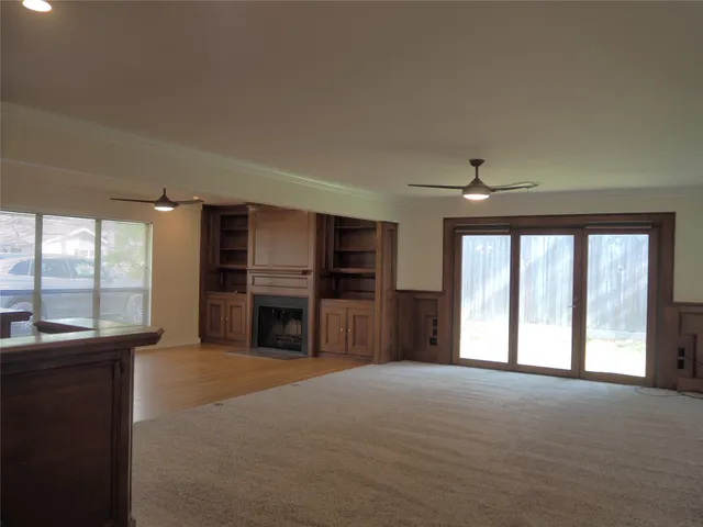 a kitchen with a refrigerator and a sink