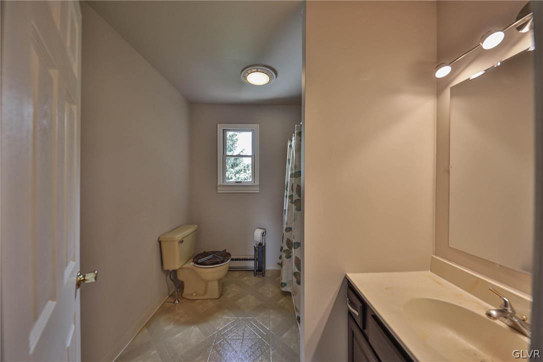 4682 Ash Drive Nazareth, PA 18064 - Photo 18 of 40 a bathroom with a sink toilet and a mirror
