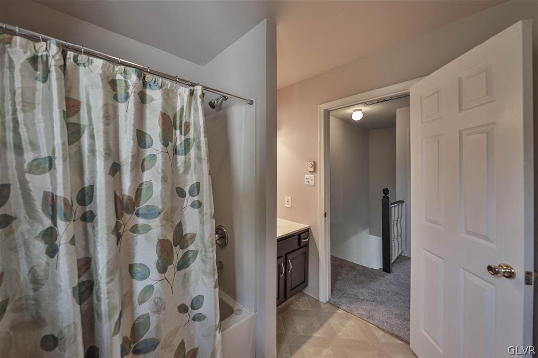 4682 Ash Drive Nazareth, PA 18064 - Photo 19 of 40 a bathroom with a shower and a sink