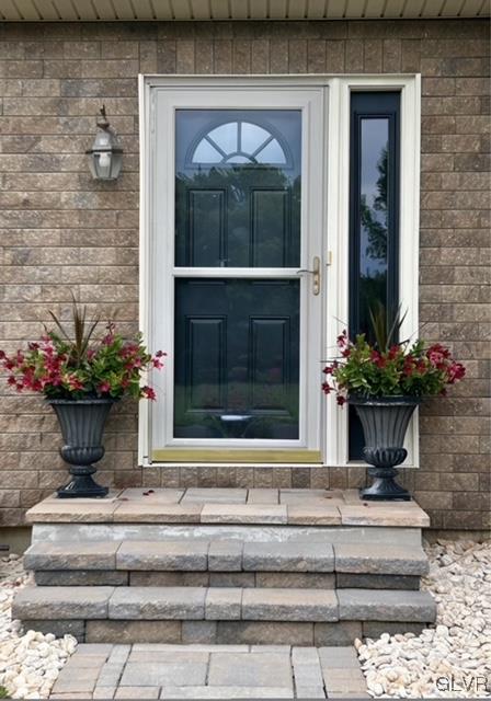 4682 Ash Drive Nazareth, PA 18064 - Photo 2 of 40 a view of a house with a potted plant