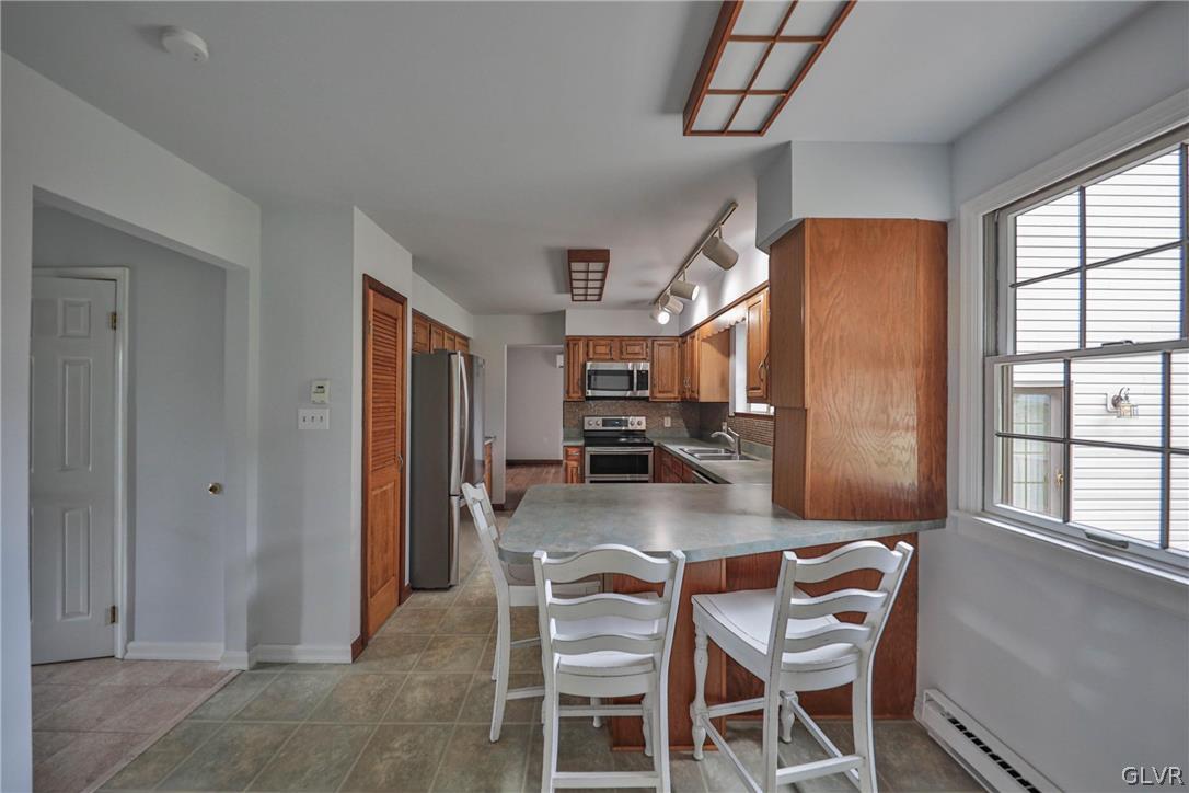 4682 Ash Drive Nazareth, PA 18064 - Photo 30 of 40 a dining room with furniture and a window
