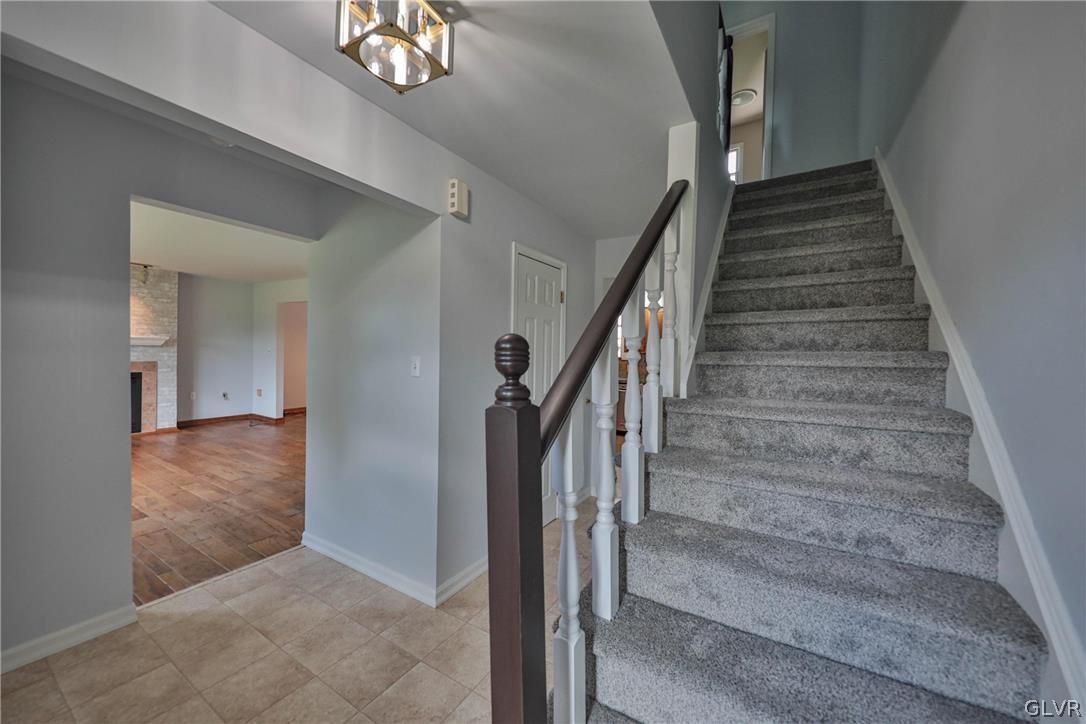 4682 Ash Drive Nazareth, PA 18064 - Photo 6 of 40 a view of entryway and hall with wooden floor