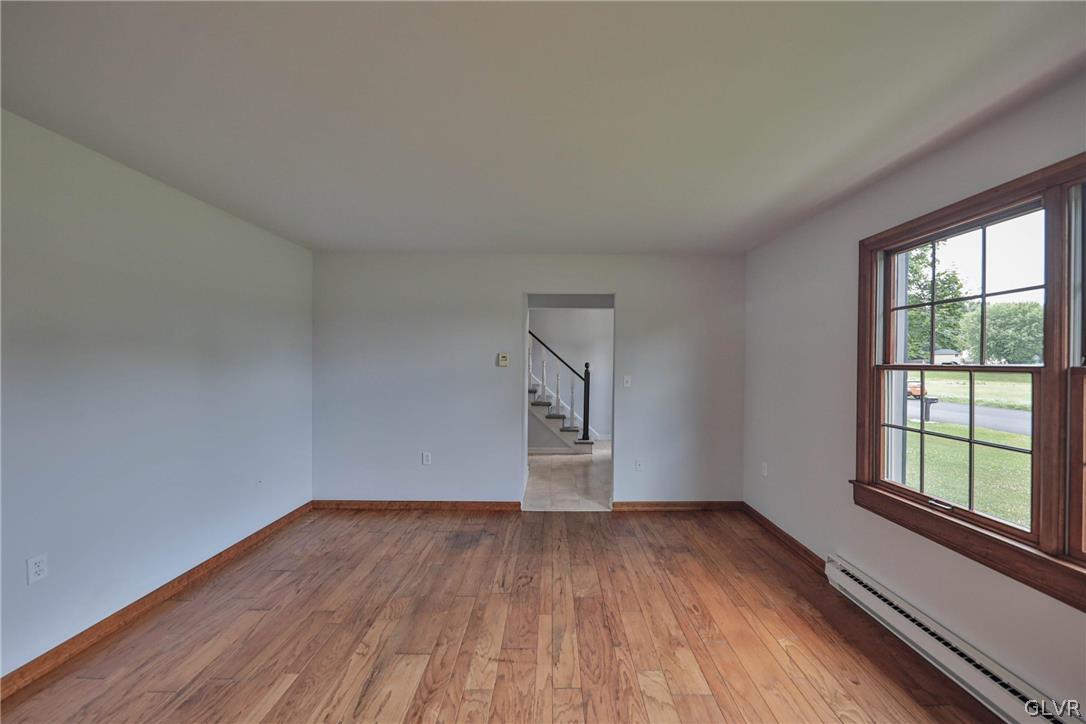 4682 Ash Drive Nazareth, PA 18064 - Photo 8 of 40 a view of empty room with wooden floor and fan