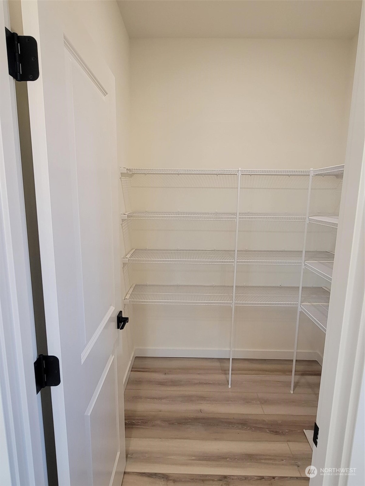 3545 Edith Avenue, Unit 28 Enumclaw, WA 98022 - Photo 7 of 10 a view of a room with shelf