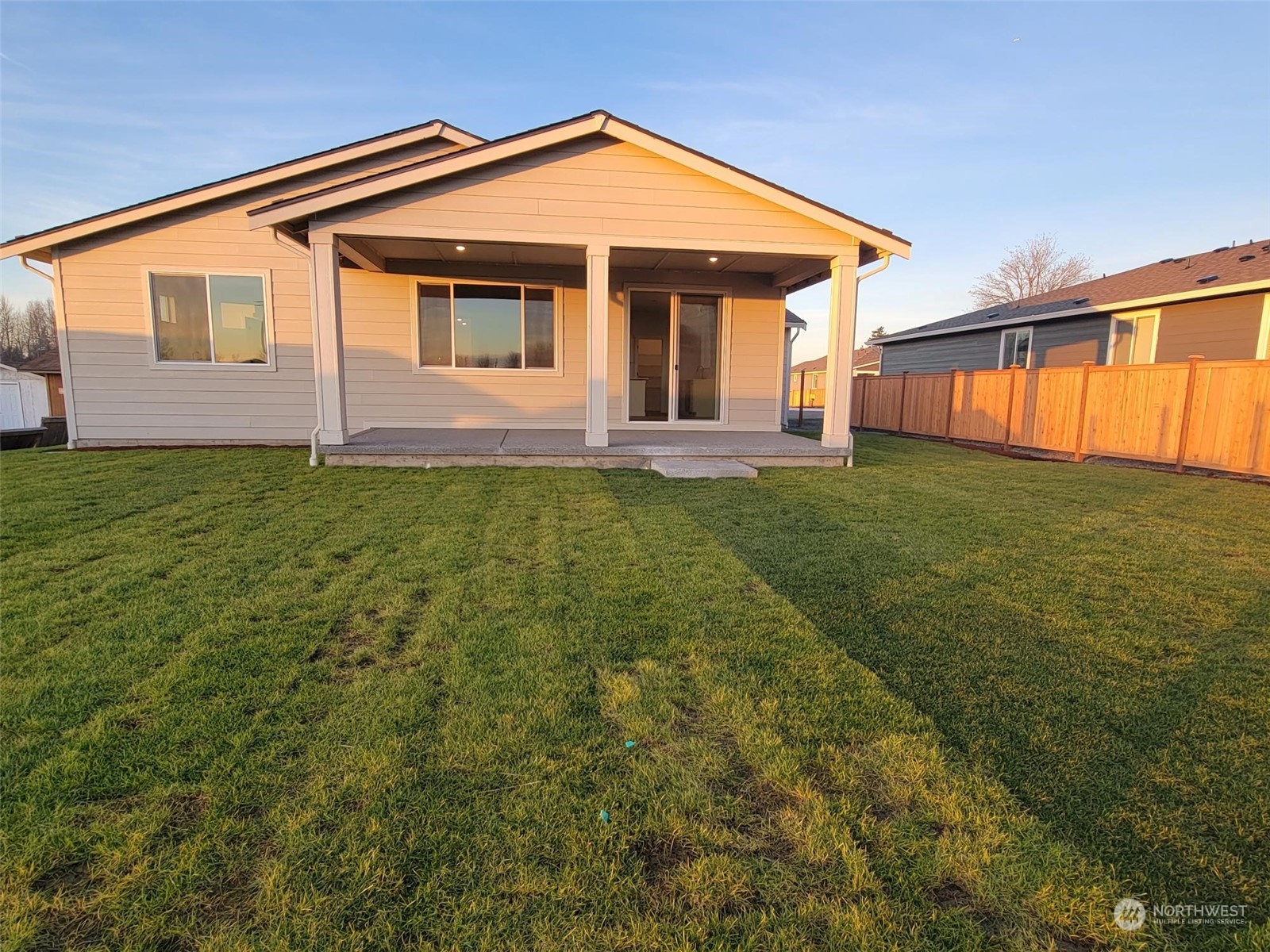 3545 Edith Avenue, Unit 28 Enumclaw, WA 98022 - Photo 9 of 10 a front view of a house with garden