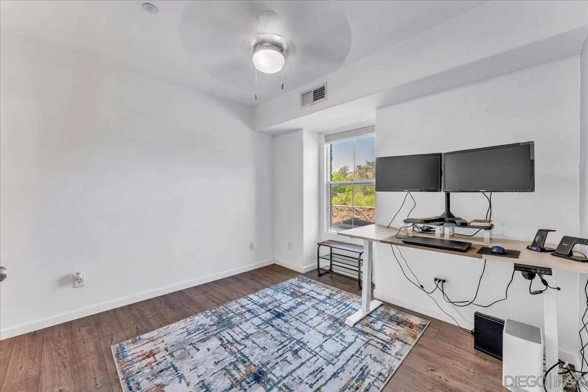 76 Via Sovana Santee, CA 92071 - Photo 21 of 34 a view of workspace with wooden floor outdoor view