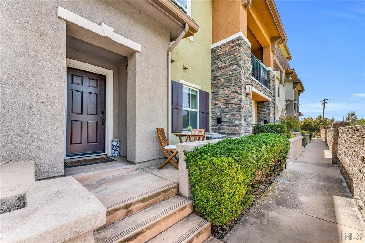 76 Via Sovana Santee, CA 92071 - Photo 27 of 34 a view of a house with a yard and potted plants