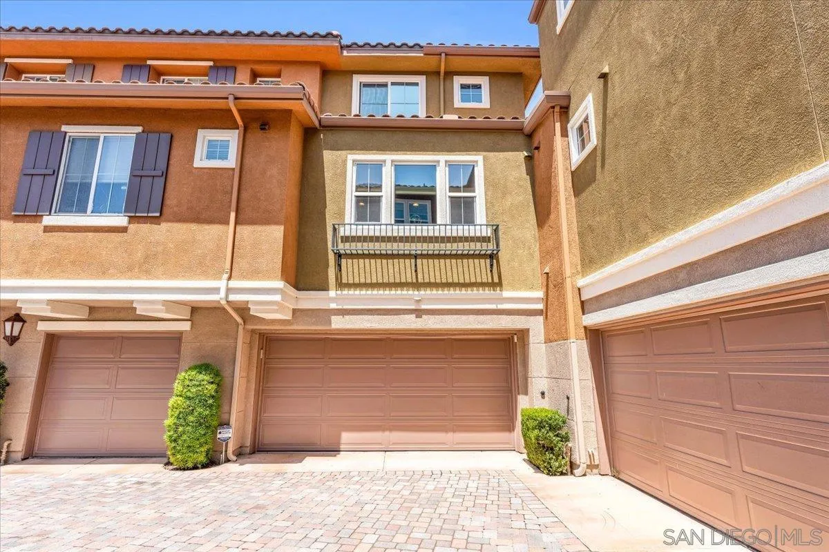 76 Via Sovana Santee, CA 92071 - Photo 29 of 34 a front view of a house with a garage