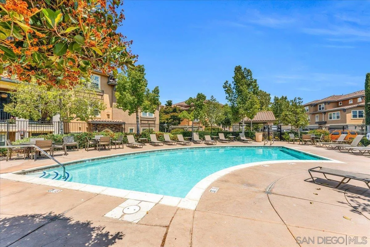 76 Via Sovana Santee, CA 92071 - Photo 30 of 34 a view of a swimming pool and a longer chairs