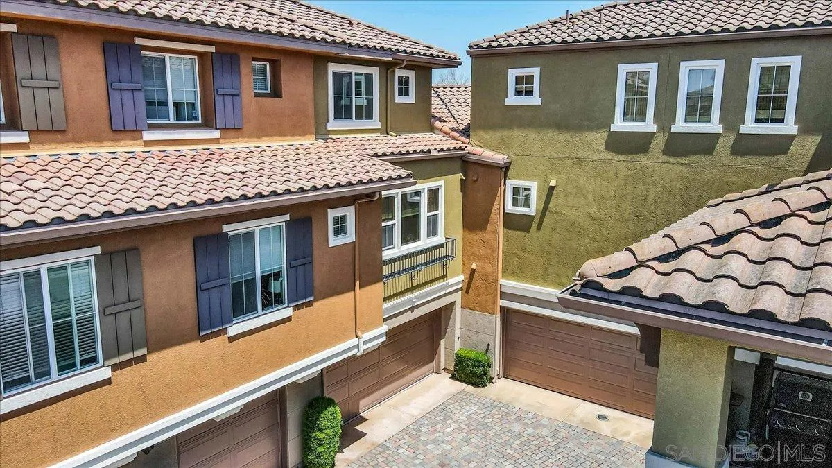 76 Via Sovana Santee, CA 92071 - Photo 32 of 34 a front view of a house with a garden