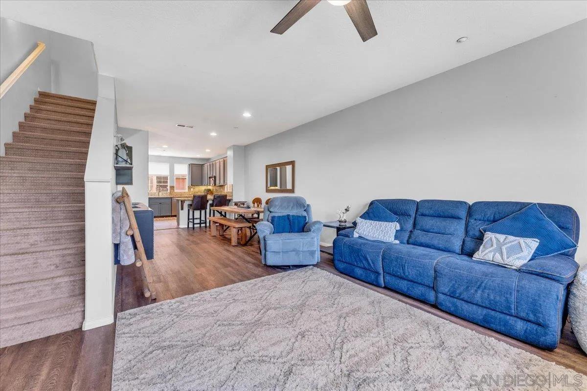 76 Via Sovana Santee, CA 92071 - Photo 9 of 34 a living room with furniture and a wooden floor