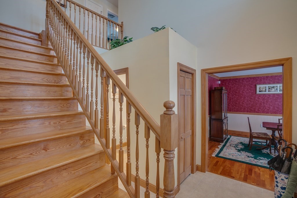 265 Renfrew Street Arlington, MA 02476 - Photo 14 of 39 a view of entryway and hall with wooden floor