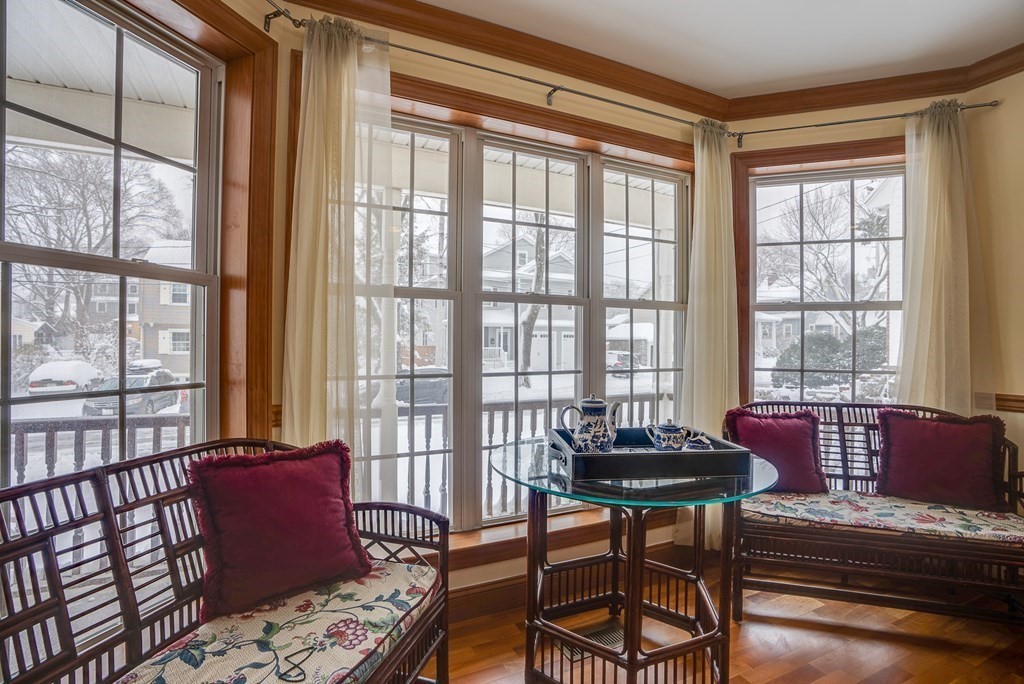 265 Renfrew Street Arlington, MA 02476 - Photo 15 of 39 a living room with furniture and a window