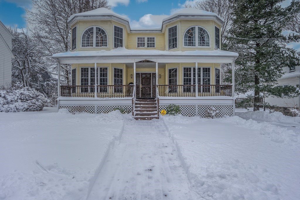 265 Renfrew Street Arlington, MA 02476 - Photo 2 of 39 front view of house with a yard