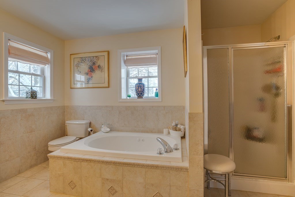 265 Renfrew Street Arlington, MA 02476 - Photo 23 of 39 a bathroom with a sink and a shower