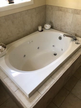 265 Renfrew Street Arlington, MA 02476 - Photo 24 of 39 a bathroom with a tub