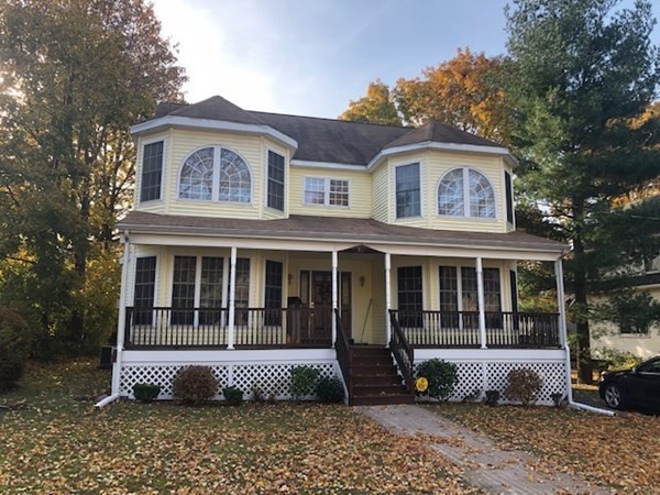 265 Renfrew Street Arlington, MA 02476 - Photo 38 of 39 a front view of a house with a yard