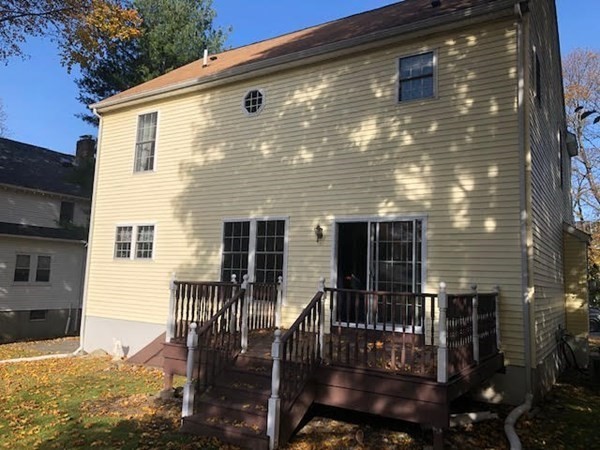 265 Renfrew Street Arlington, MA 02476 - Photo 39 of 39 a front view of house with yard outdoor seating and yard