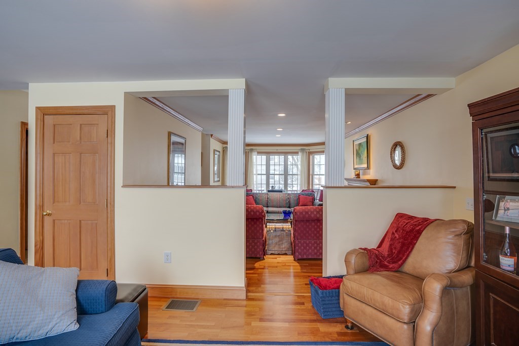 265 Renfrew Street Arlington, MA 02476 - Photo 6 of 39 a living room with furniture and wooden floor