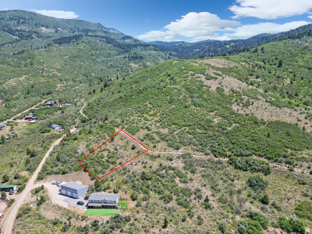 2459 Painter Road Marion, UT 84036 - Photo 8 of 42 Expansive mountain landscape featuring varied green foliage and distant mountain ranges