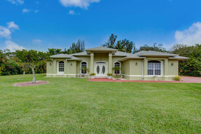 9481 154th Road North Jupiter, FL 33478 - Photo 1 of 32 Front elevation
