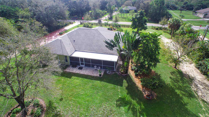 9481 154th Road North Jupiter, FL 33478 - Photo 3 of 32 Back Aerial