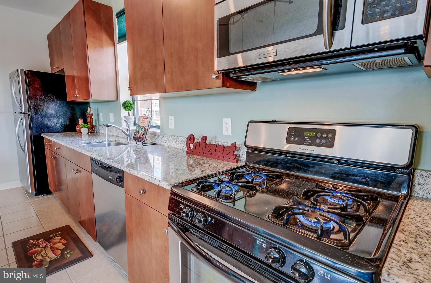 3201 St Paul Street, Unit 424 Baltimore, MD 21218 - Photo 24 of 36 Kitchen - Stainless Steel Appliances